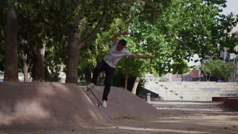 Skateboarder-does-a-trick-on-a-street-quarter-pipe-in-Greece