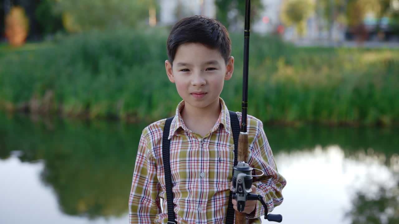 Boy Fishing in a Park