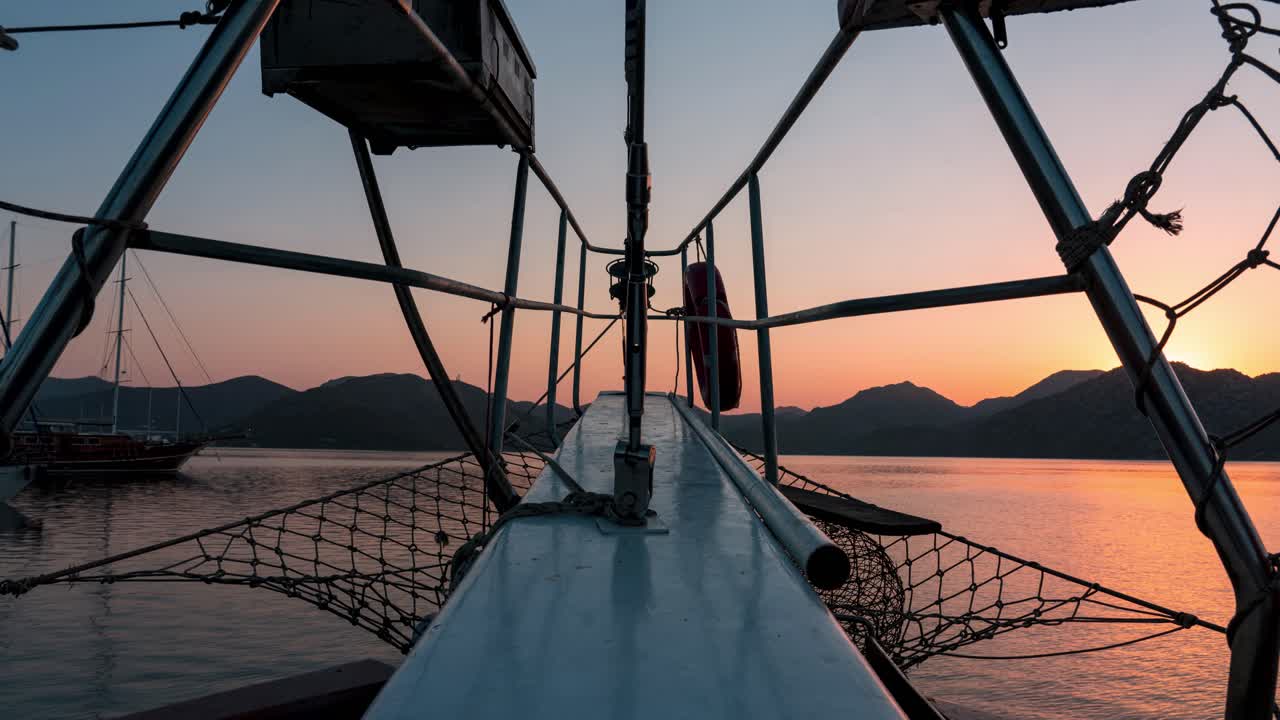 Sunrise Time lapse From Bow Of Boat in mediterranean sea with Golden Yellow air With Pink Sky