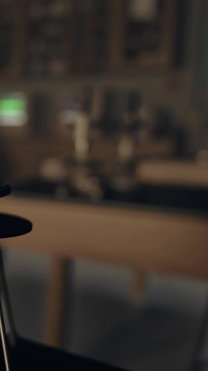 Cup sits on a kitchen counter while a warm light shines in the background
