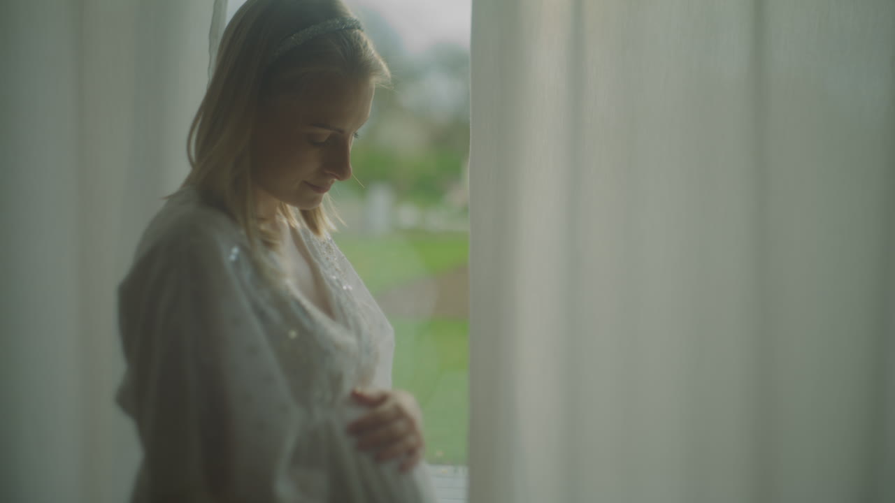 Pregnant Woman Stroking Belly