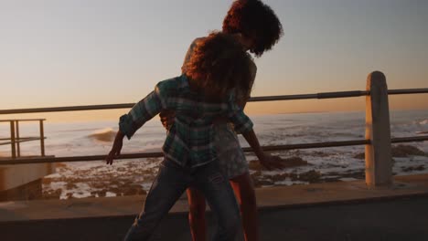 mother and son having fun at sunset