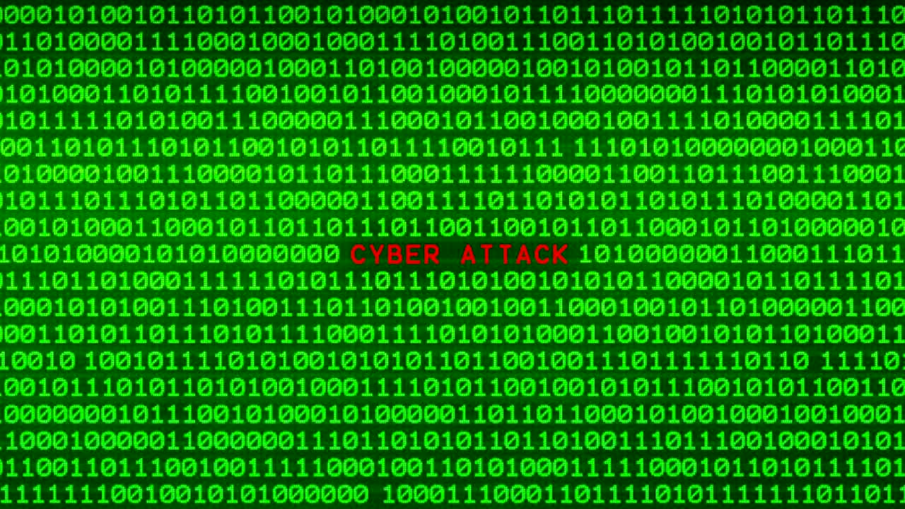 CYBER ATTACK Word Revealing on Wall of Green Binary Code  Between Random Binary Data Matrix Background