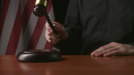 judge with gavel in courtroom