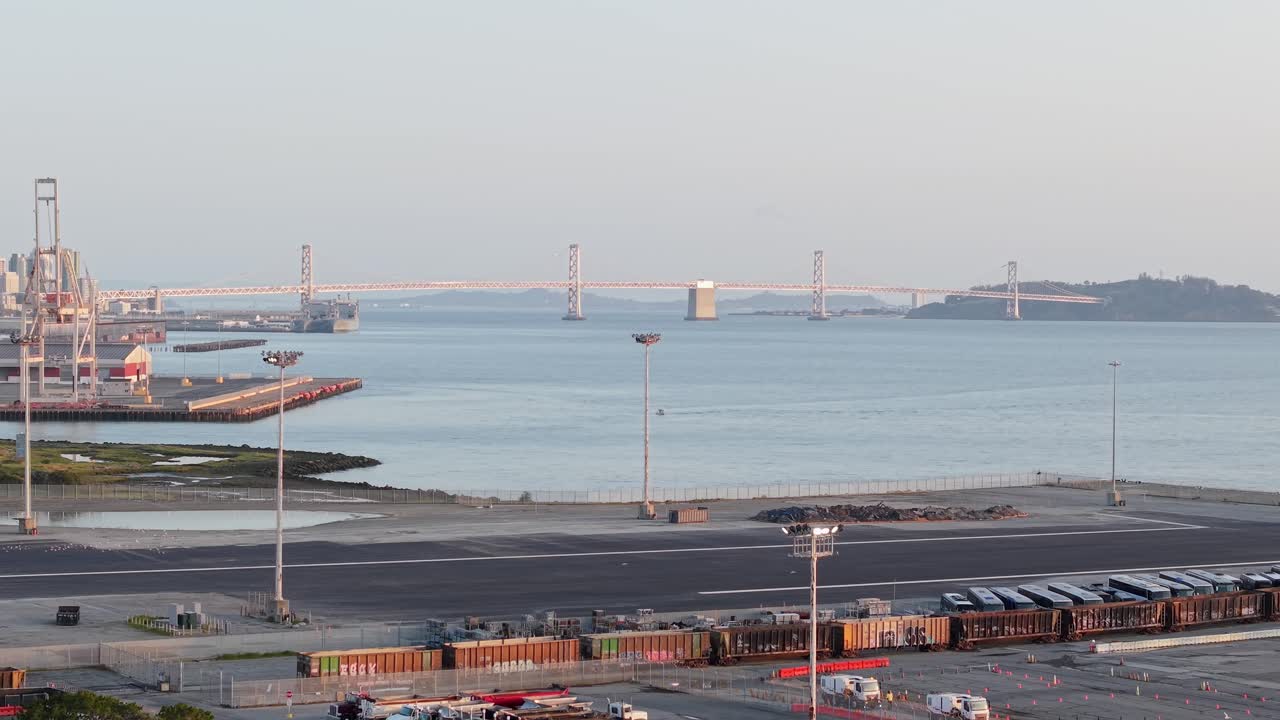 A lockdown aerial view of the San Francisco Bay Bridge in the distance.