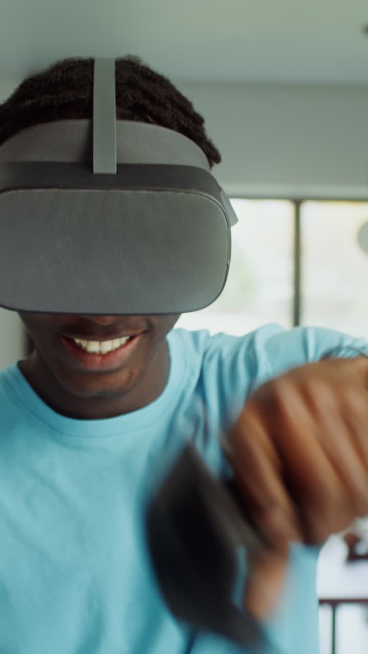 A man wearing a virtual reality headset indoors