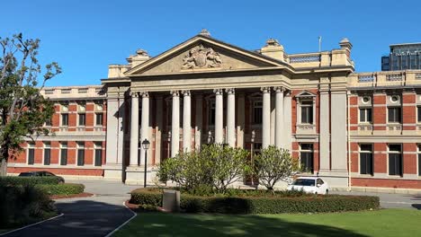 Supreme-Court,-Stirling-Gardens,-Perth,-Western-Australia-on-a-bright-sunny-day-with-blue-sky