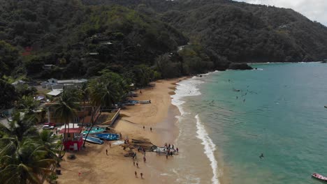 Stunning-aerial-view-of-a-shoreline-with-fishermen-attending-to-the-dragnet-catch