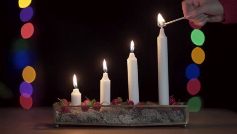 Lighting the fourth advent candle