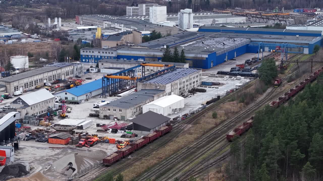 Industrial buildings and cargo train loading bays in Vilnius, aerial view