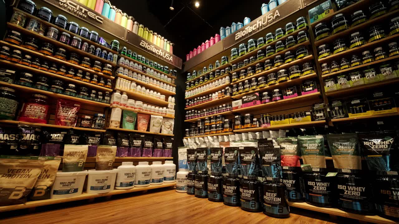 Sport nutrition store interior with large choice of nutritional supplements.