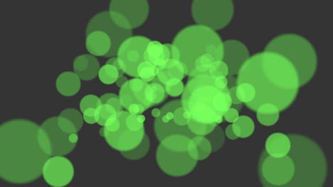 fly abstract green particles and glitters on black gradient 1