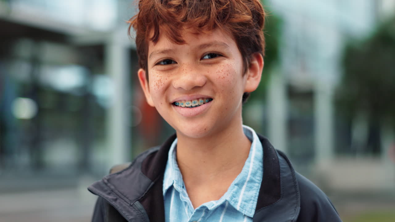 Portrait of a smiling boy with braces