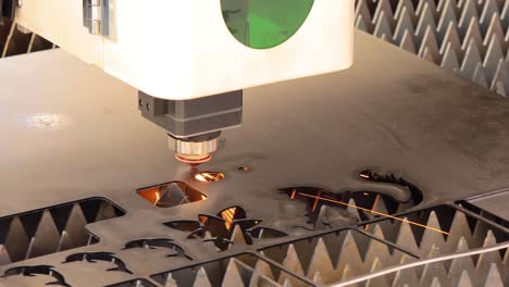 cnc laser cutting of metal, modern industrial technology.