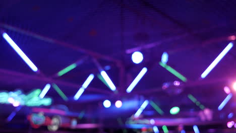 Illuminated-spinning-party-lights-at-disco-club,wide-blur-shot