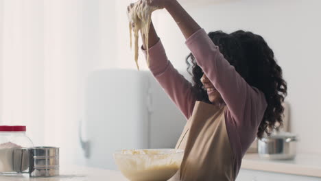 happy child mixing dough