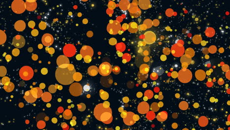 digitally generated video of yellow and orange glowing spots moving against black background