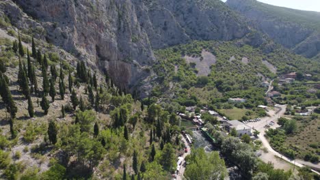 Aerial-orbit-valley-with-river-Buna-in-Blagaj-Tekija-in-Bosnia-and-Herzegovina