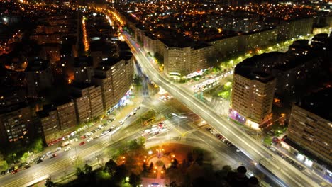 Aerial-hyperlapse-over-Pasajul-Doamna-Ghica-at-night-in-Bucharest,-Romania