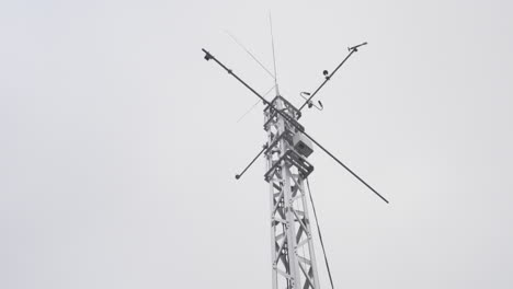 Tilt-up-shot-of-measuring-antenna-on-the-roof-of-the-institute-for-geology-at-university-of-Muenster