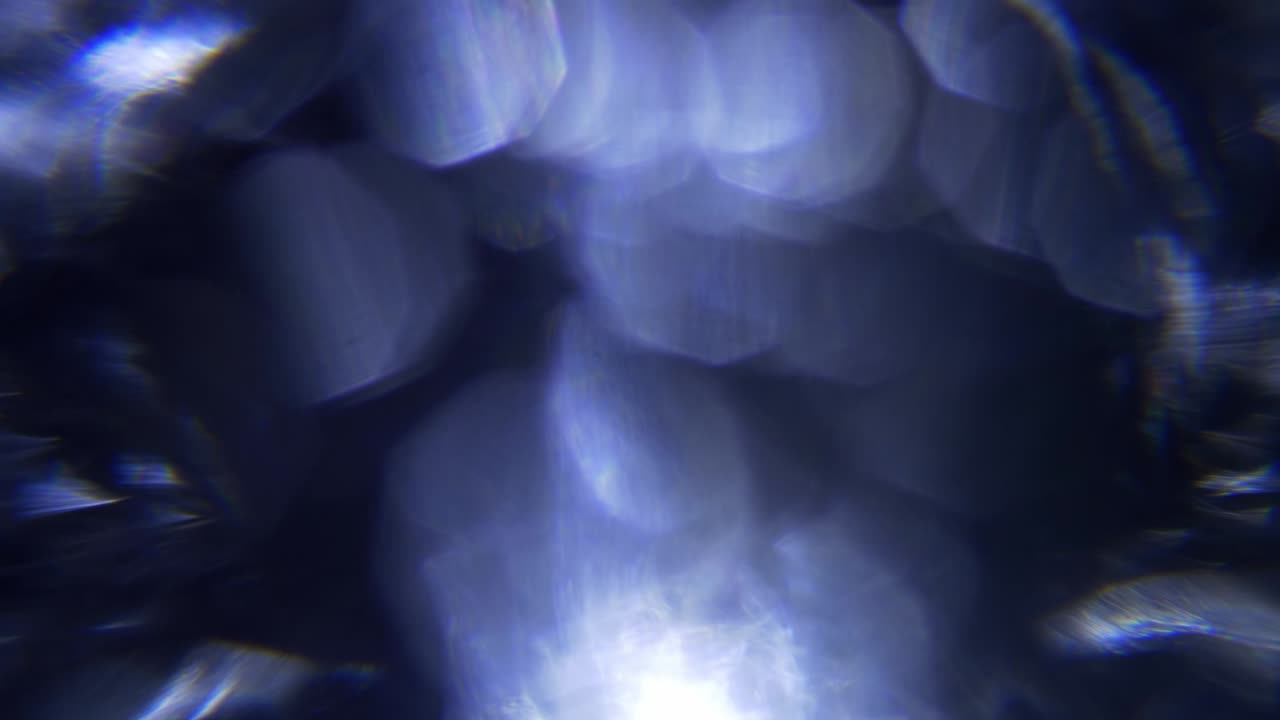 Ethereal Blue and Purple Light Leaks with Bokeh Effect