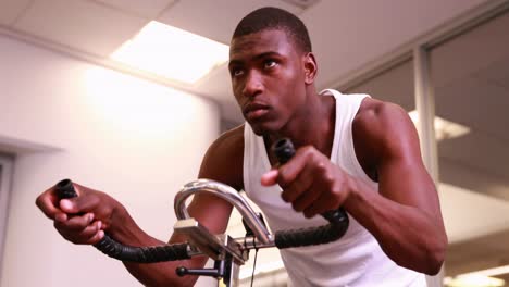 fit man working out on the exercise bike