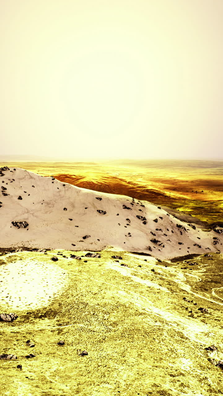 Golden hues spread across the horizon