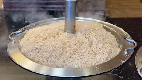 Close-up-view-of-the-rice-vermicelli-keeping-warm-in-the-food-steamer