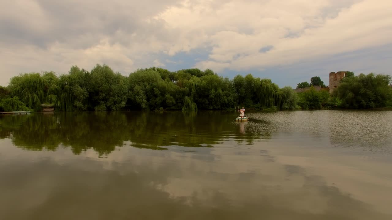 aerial view of a loving couple on a boat 08