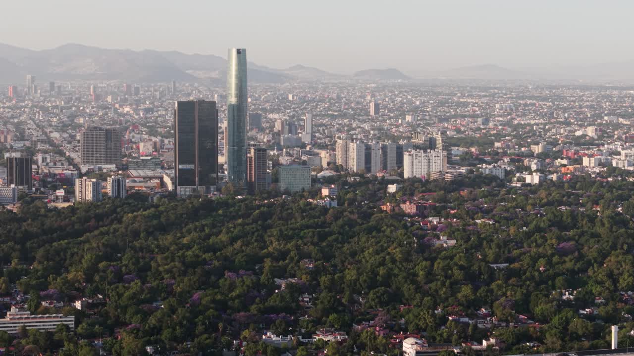 Sunset over the vast city of Mexico, captured by a drone with a 70mm lens