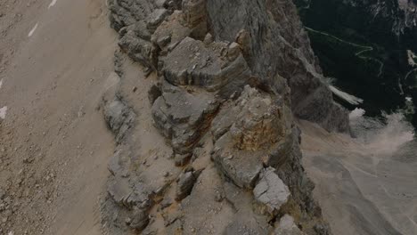 Aerial-top-down-shot-of-Monte-Pelmo-Mountain-peak-and-beautiful-landscape-in-Italy-during-sunny-day--