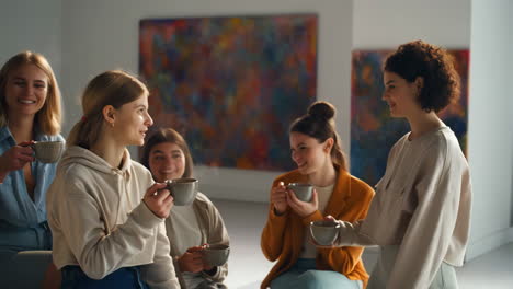 group of women enjoying coffee together