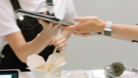 tablet transaction at a restaurant