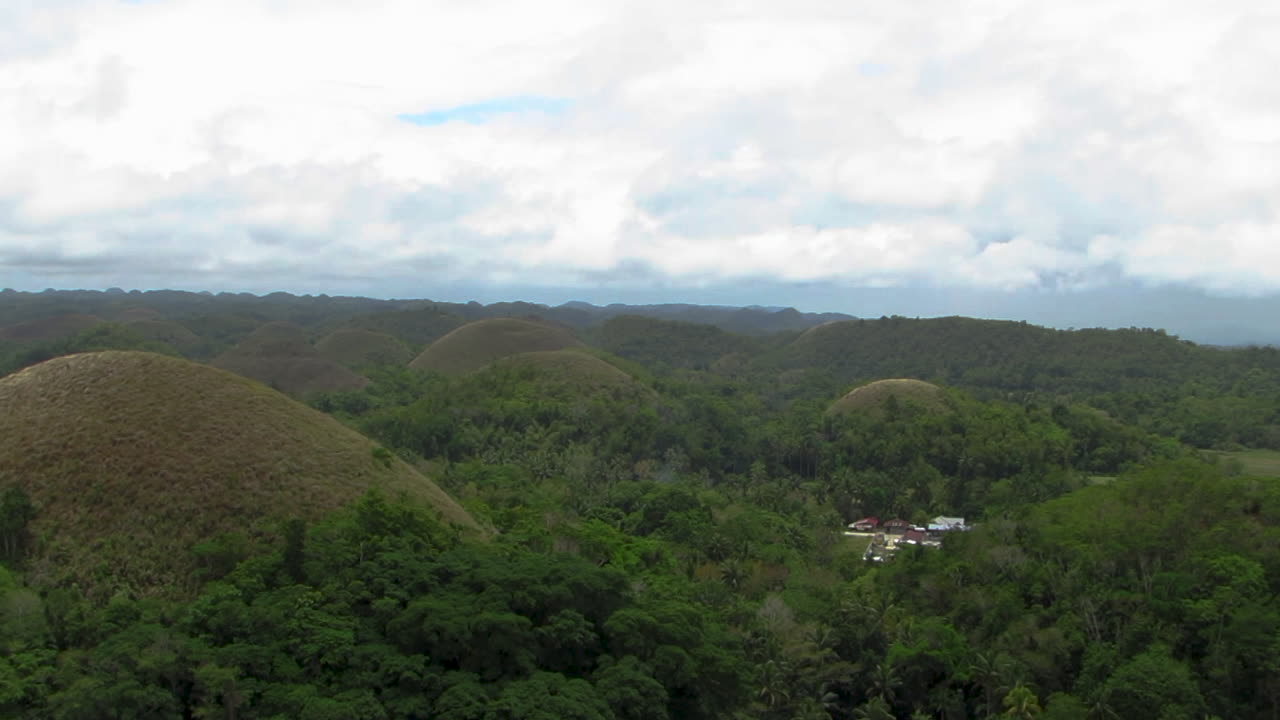 Relaxing View of Chocolate Hills During Cloudy Weather in Bohol, Philippines