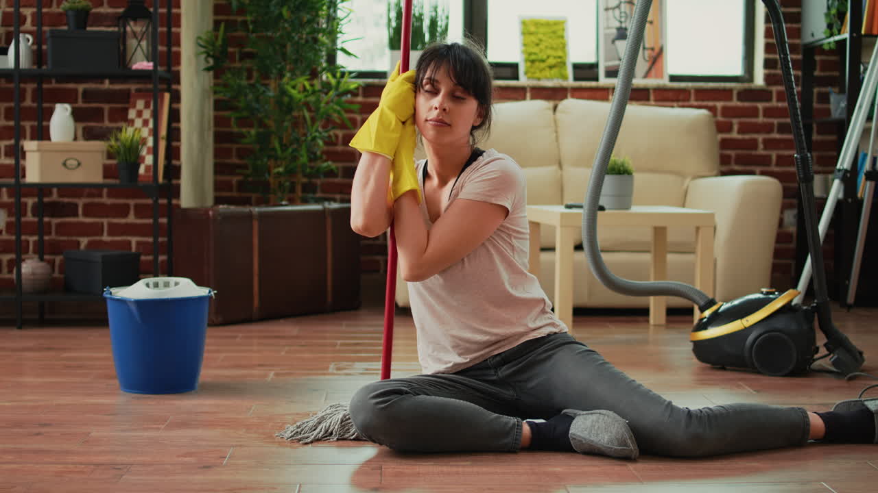 Caucasian housewife feeling sleepy after finishing spring cleaning session
