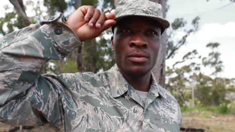 Military-soldier-looking-around-in-park