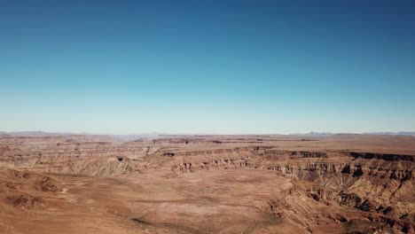 Fish-River-Canyon-in-Namibia,-Africa-Aerial-Drone-Shot