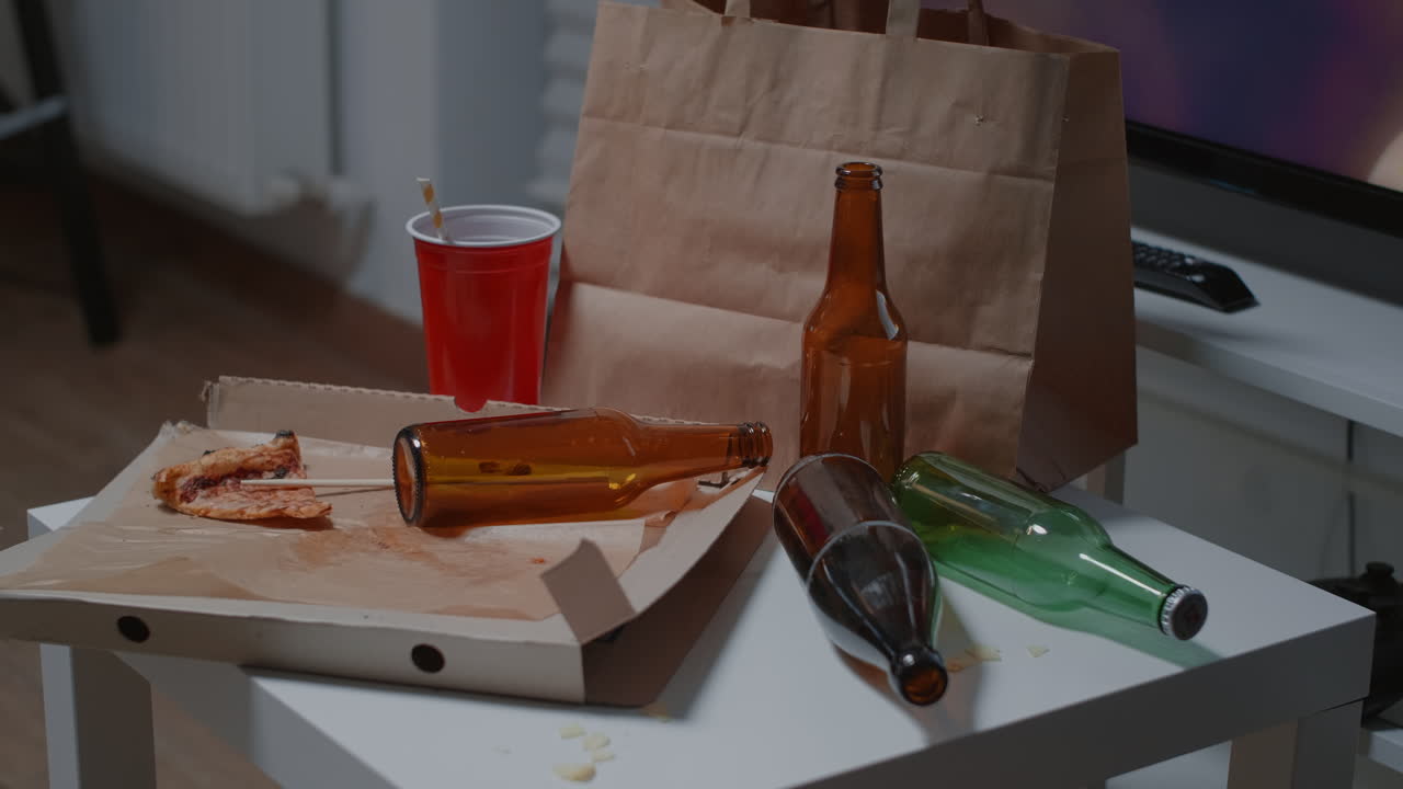 Dirty home of alone person with sever depresion having trash on messy table