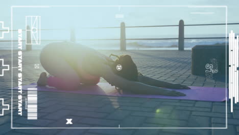 stretching in yoga pose on mat, fitness tracking animation over outdoor scene