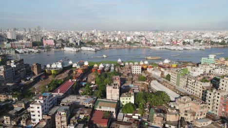 aerial of two cityscape sides of huge asian populated city