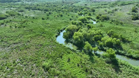 windy river in midlothian leading to the lake