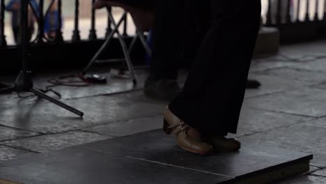 Close-up-of-female-flamenco-dancer-feet-dancing-in-slow-motion