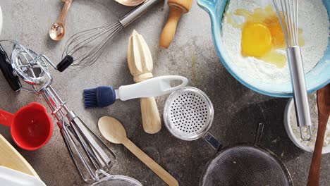 gingerbread cookies ingredients with various utensils on table 4k