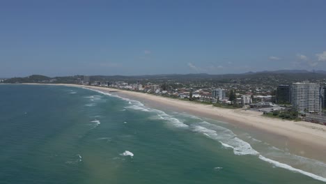 Sandy-Palm-Beach-And-Turquoise-Blue-Coral-Sea-In-Gold-Coast,-QLD,-Australia