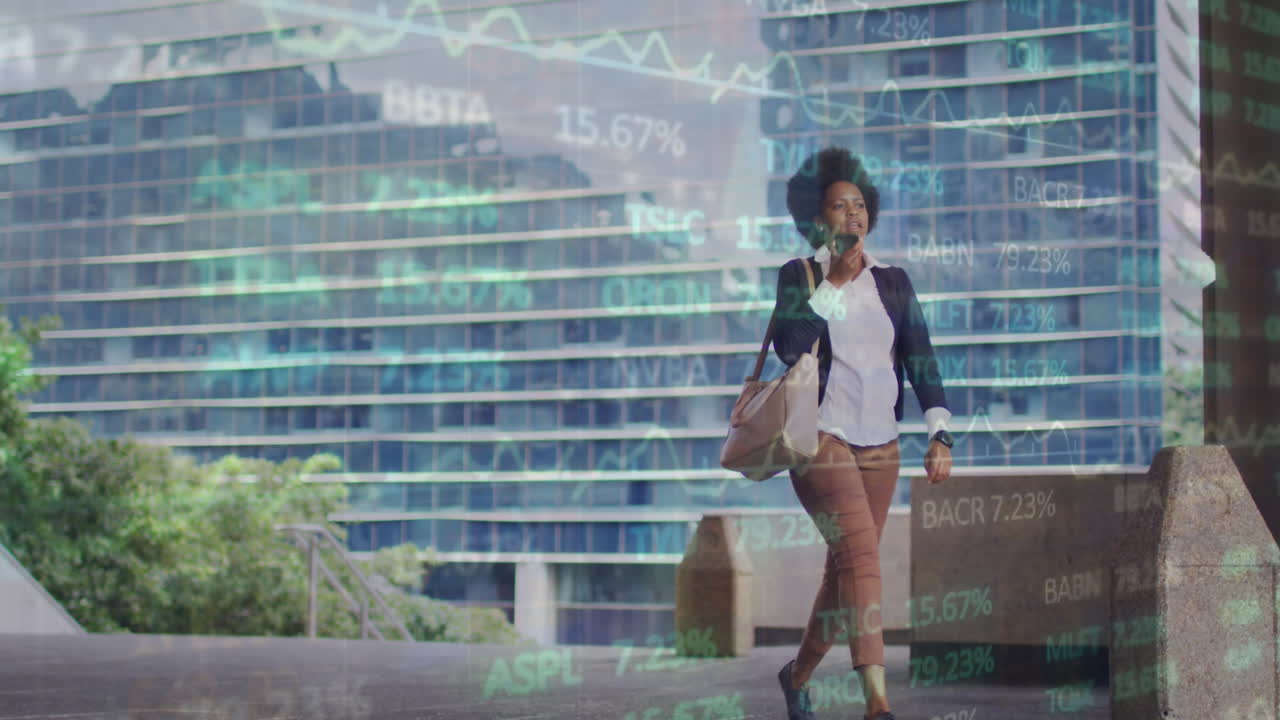 Animation of trading board over african american woman sending voicemail over phone against building