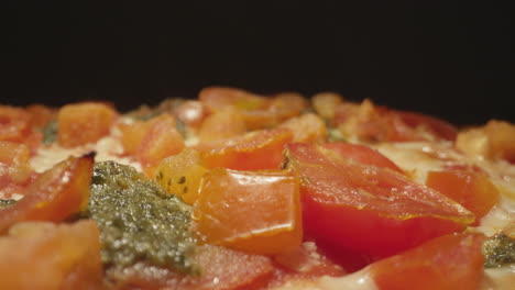 Close-up-macro-view-of-an-artisan-pizza-coming-fresh-out-of-the-oven