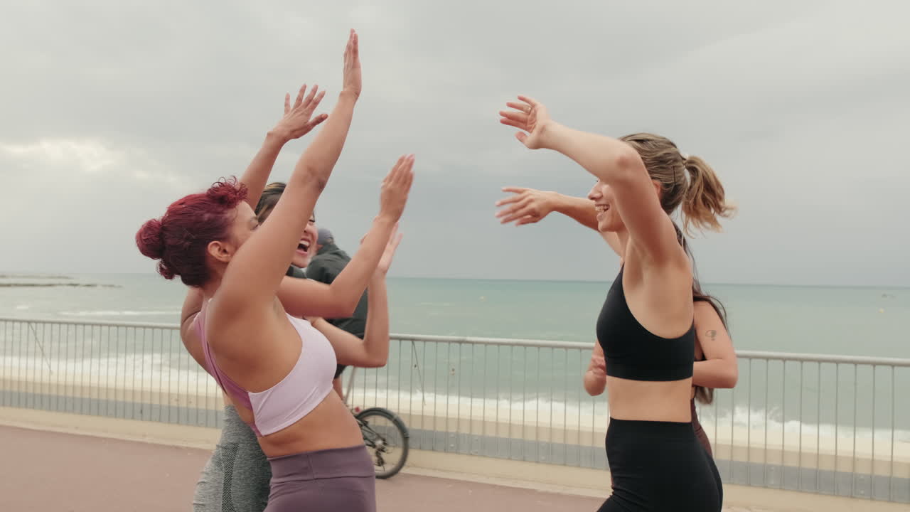 Friends Celebrate Fitness on Beach Boardwalk