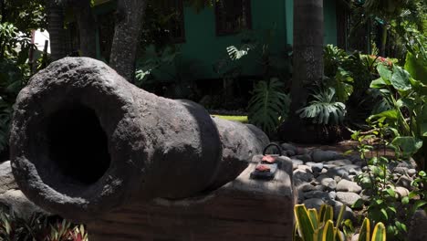 old cannon on display at historic house museum of the writer james norman hall in papeete,tahiti.