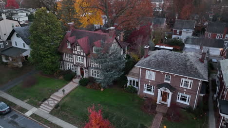 aerial establishing shot of upscale expensive mansions in american suburb