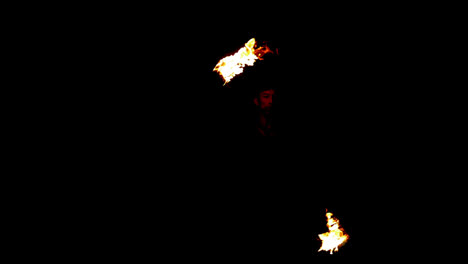 Fire-dancer-dancing-with-spinning-fire-in-the-dark